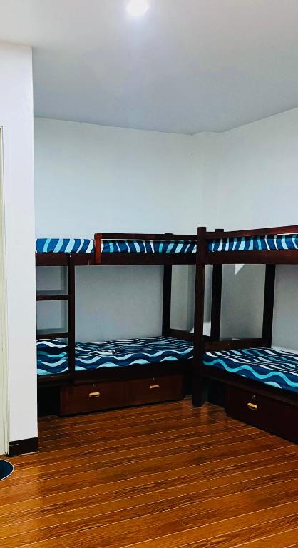 Postel nebo postele na pokoji v ubytování Tres Marias Place