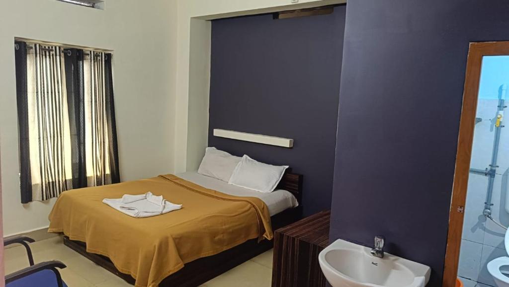 Koupelna v ubytování Hotel Orginal Residency