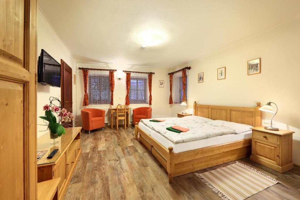 Postel nebo postele na pokoji v ubytování Penzion Tilia