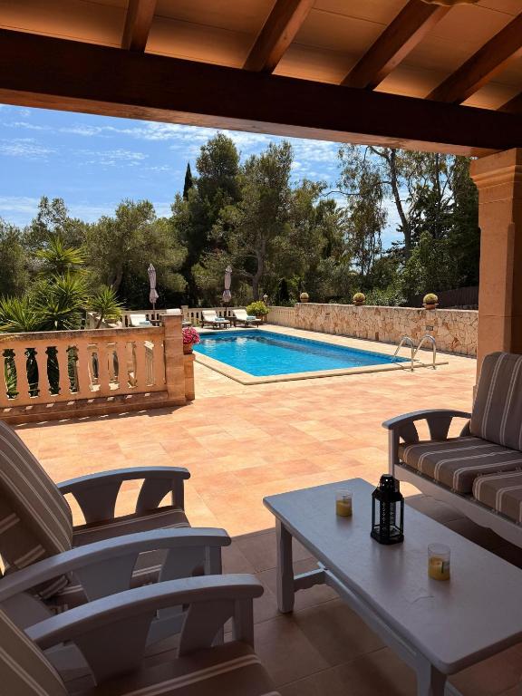 The swimming pool at or close to Es Turó de França
