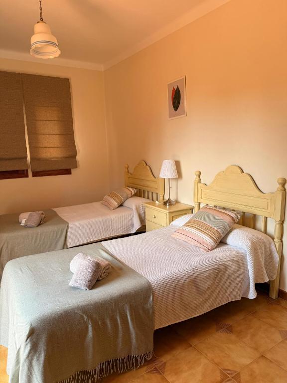 A bed or beds in a room at Es Turó de França