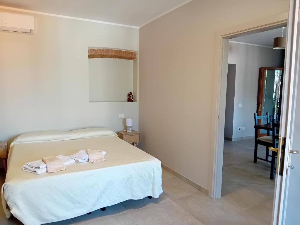 Postel nebo postele na pokoji v ubytování B&B Aria Di Lago