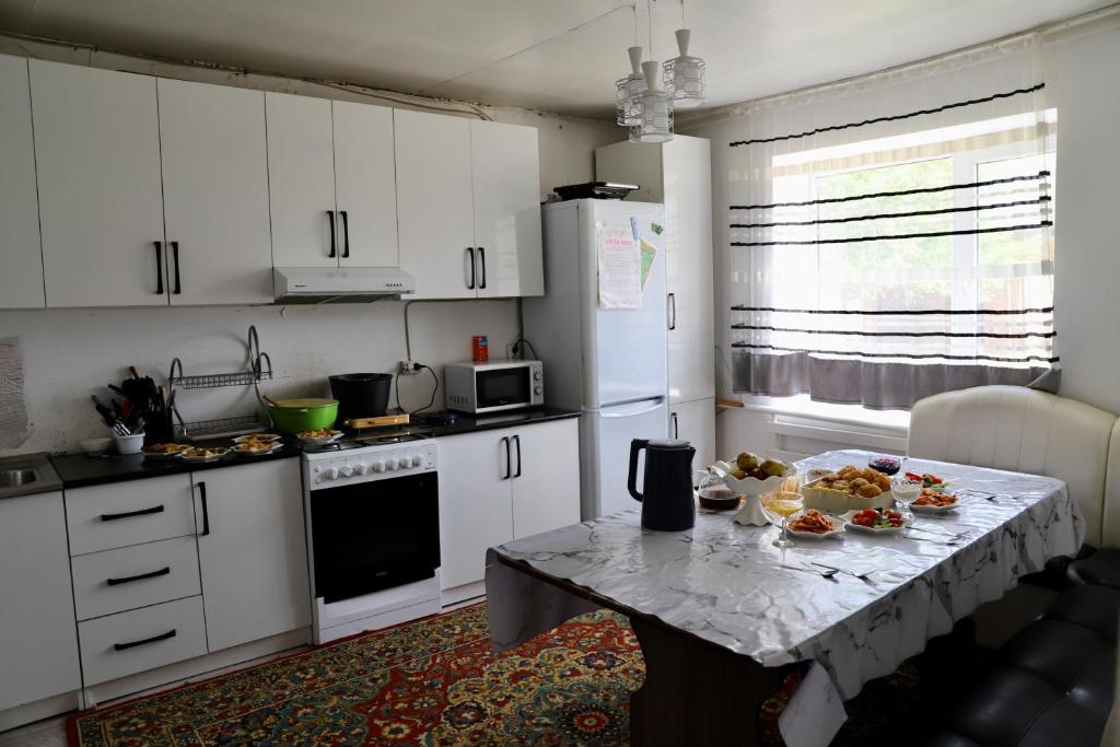 Η κουζίνα ή μικρή κουζίνα στο Nagima guest house