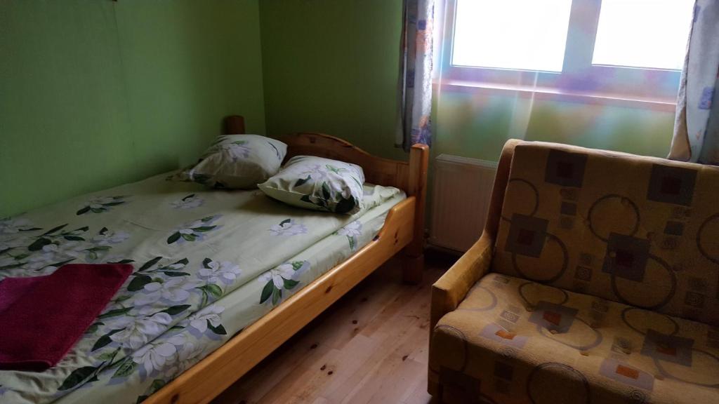 Postel nebo postele na pokoji v ubytování Apelsīns