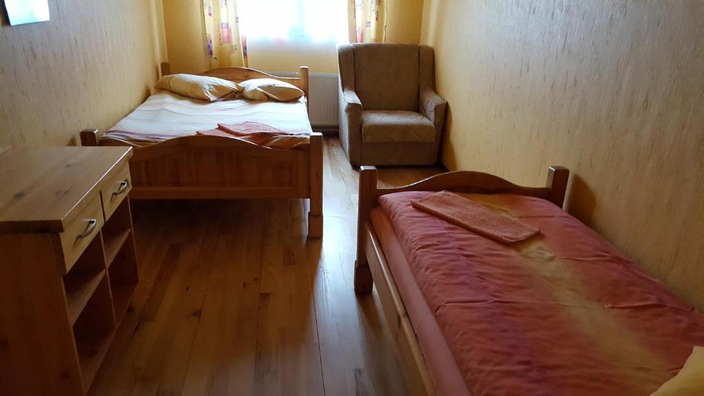 Postel nebo postele na pokoji v ubytování Apelsīns