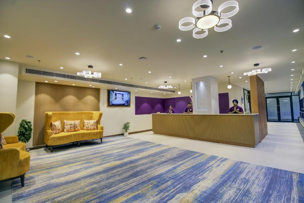 TV a/nebo společenská místnost v ubytování The Bindal Hotel