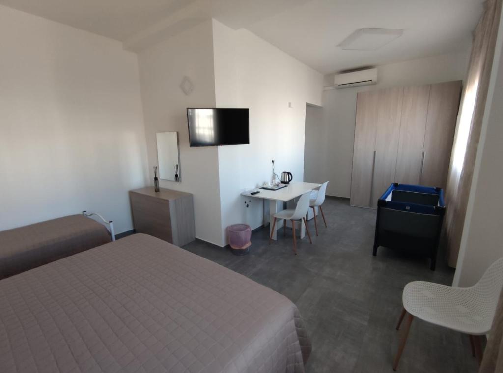 TV a/nebo společenská místnost v ubytování Hotel Bastione