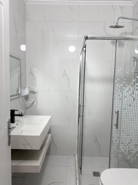 Koupelna v ubytování Hotel Bleart