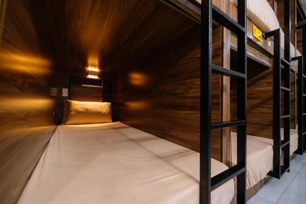 Postel nebo postele na pokoji v ubytování Ha Giang Loop Discovery Hostel