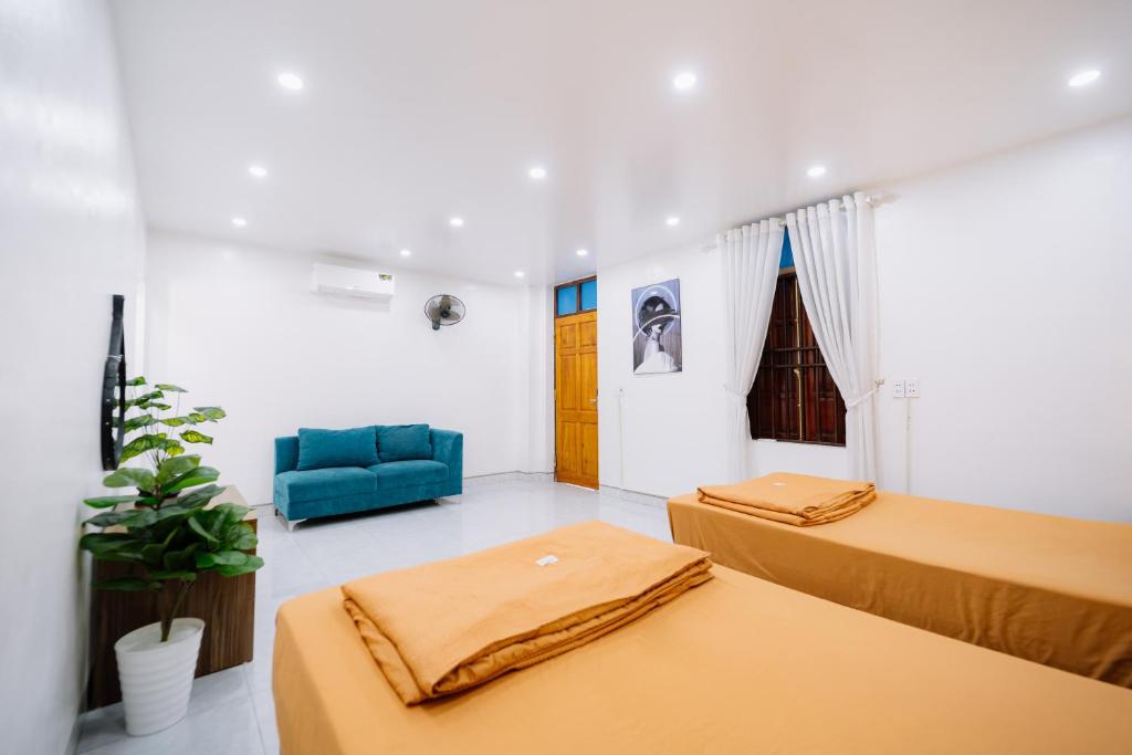 Postel nebo postele na pokoji v ubytování Ha Giang Loop Discovery Hostel