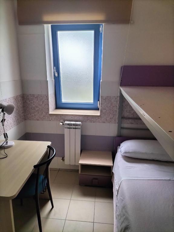 Postel nebo postele na pokoji v ubytování basilicata al volo