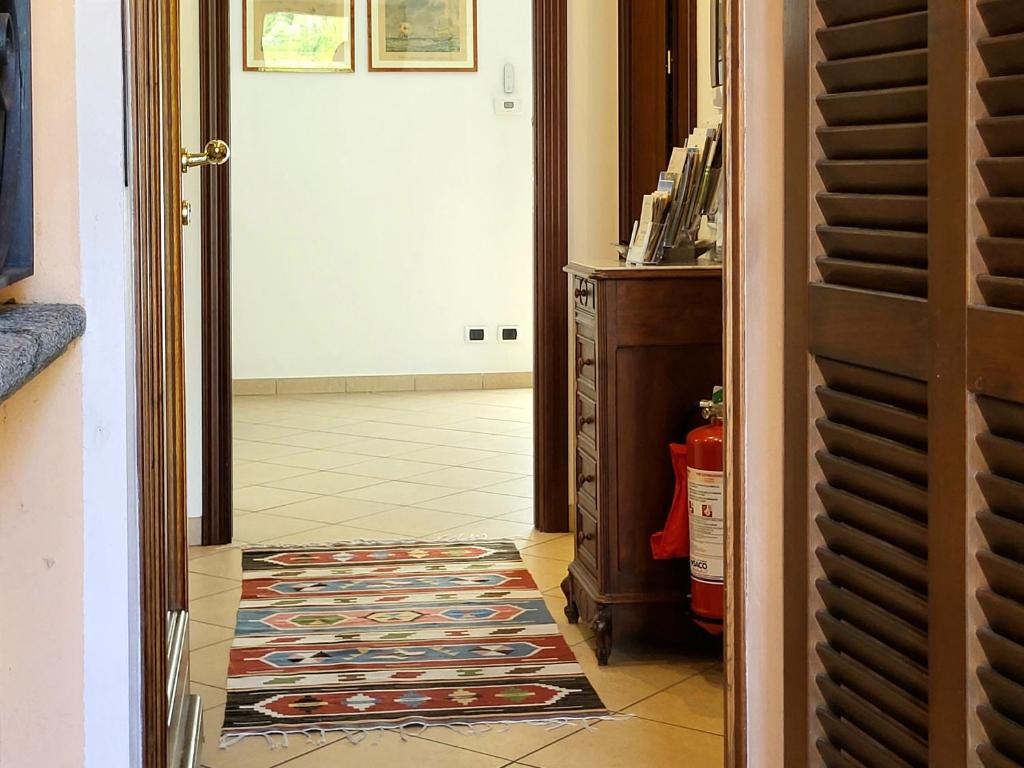 Postel nebo postele na pokoji v ubytování Casa Intignano - appartamento con terrazzo vista lago