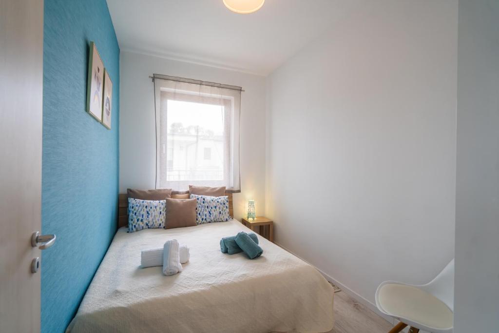 Posteľ alebo postele v izbe v ubytovaní Fox apartman A11