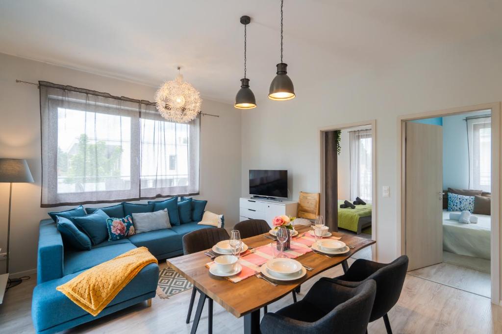 Televízia a/alebo spoločenská miestnosť v ubytovaní Fox apartman A11