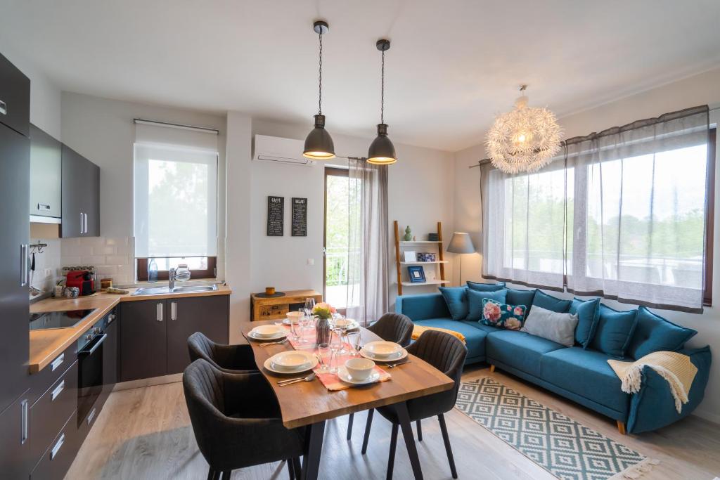 Kuchyňa alebo kuchynka v ubytovaní Fox apartman A11
