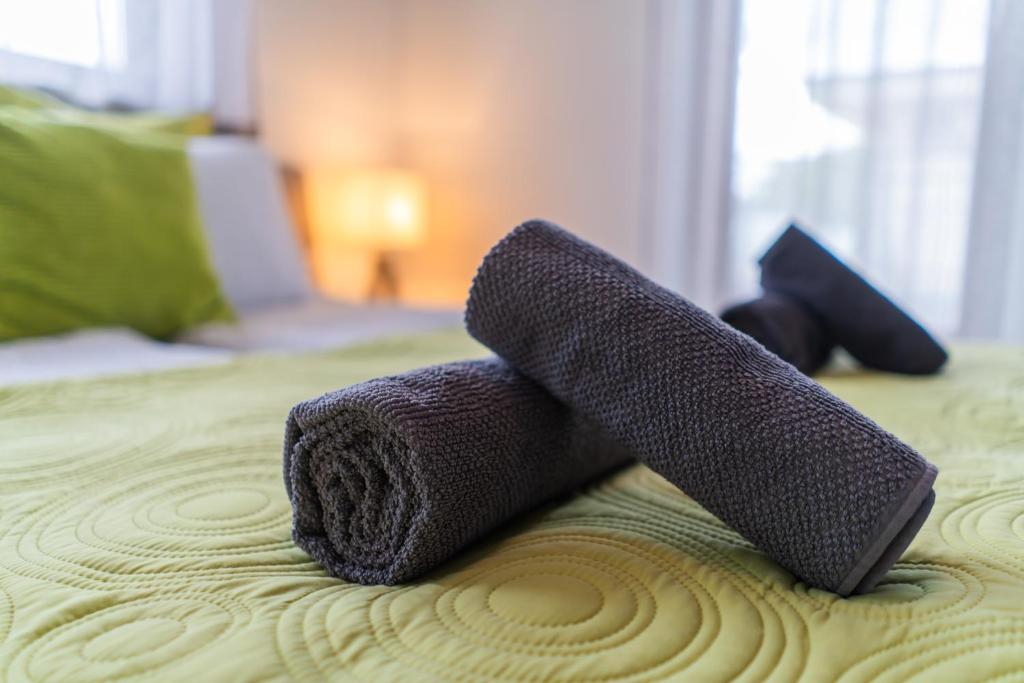 Posteľ alebo postele v izbe v ubytovaní Fox apartman A11