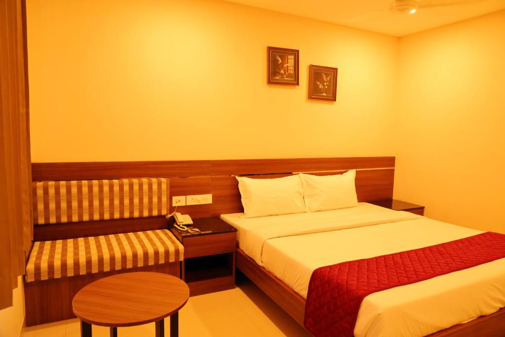 Postel nebo postele na pokoji v ubytování Hotel Le Palace