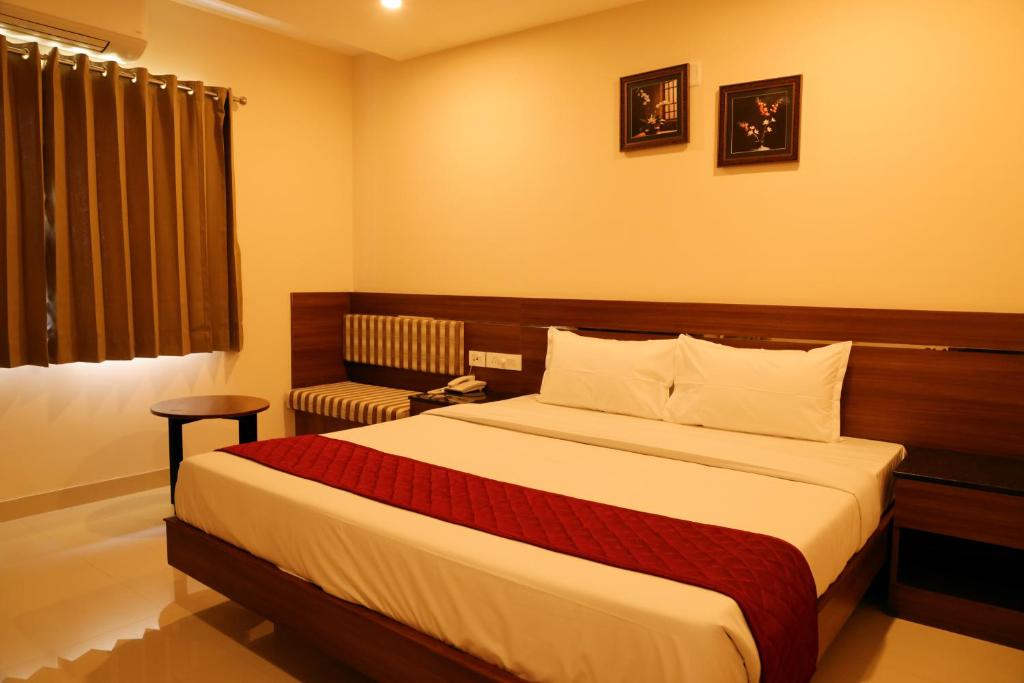 Postel nebo postele na pokoji v ubytování Hotel Le Palace