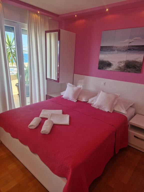 Postel nebo postele na pokoji v ubytování Villa Grgo Apartments