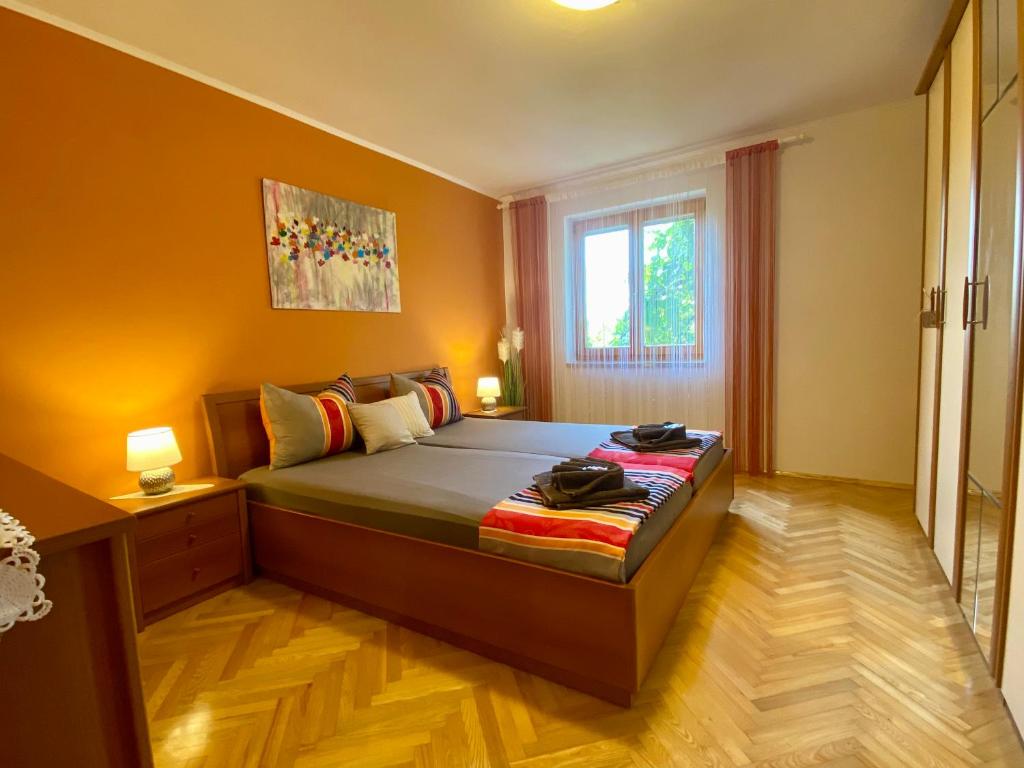 Posteľ alebo postele v izbe v ubytovaní Apartments 4Mios