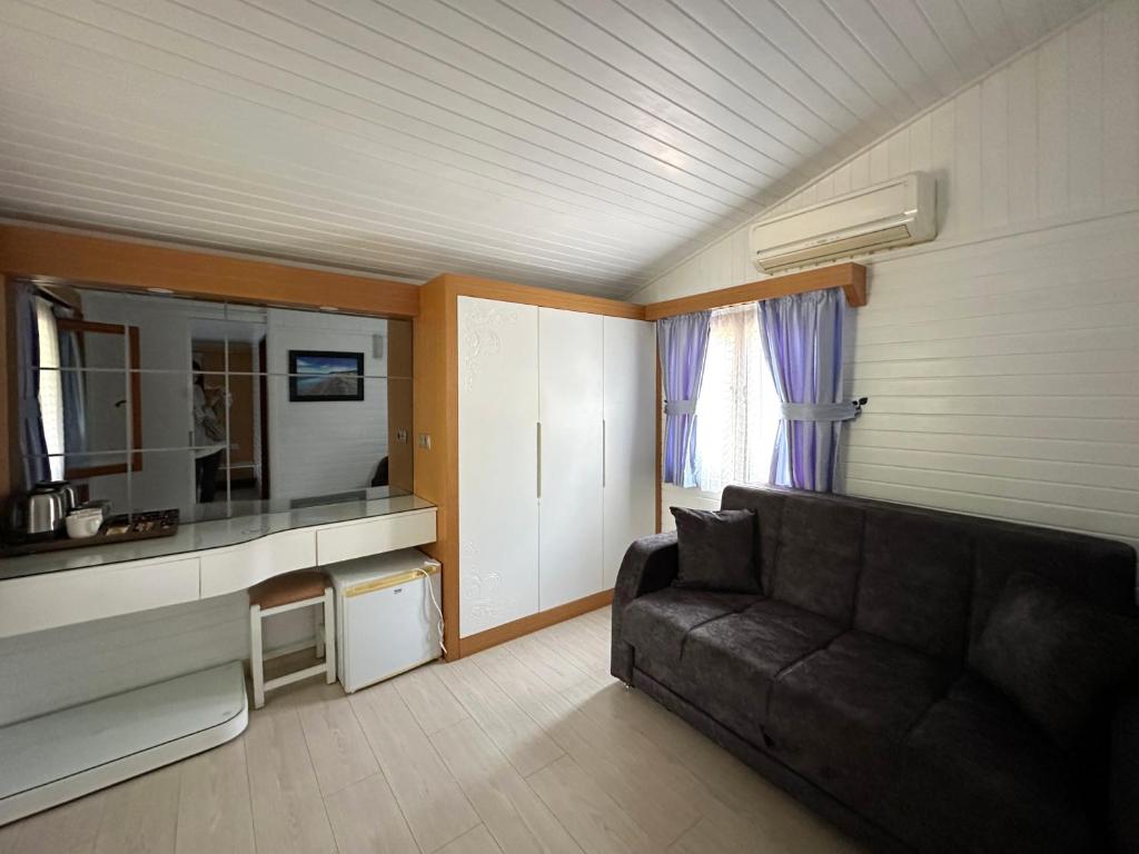 Kuchyň nebo kuchyňský kout v ubytování Azur Hotel