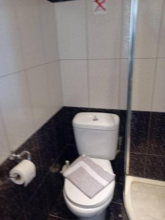 Koupelna v ubytování Hotel Assini Beach Tolo