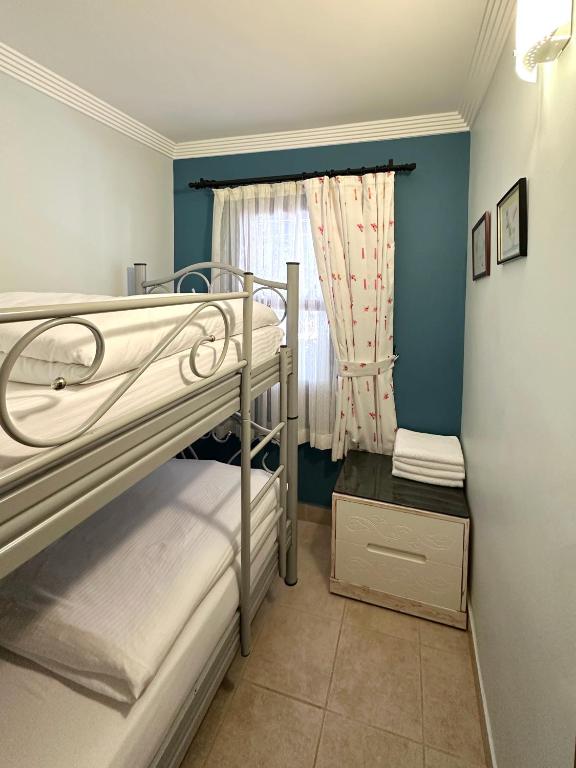 Postel nebo postele na pokoji v ubytování Azur Hotel