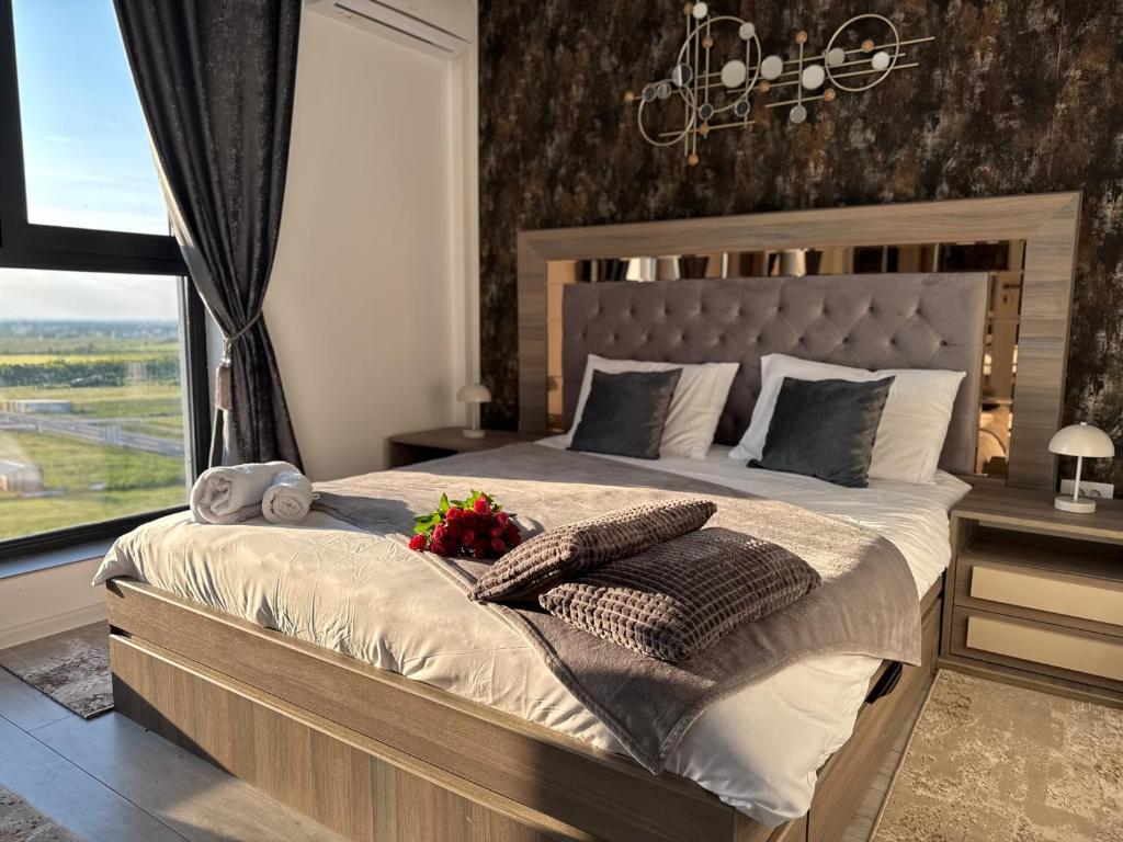 Postel nebo postele na pokoji v ubytování Kuib apartment