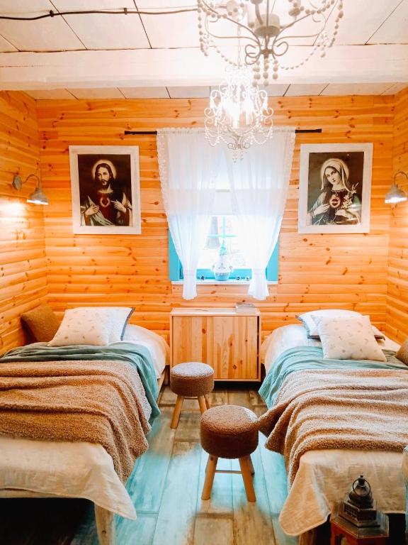 Postel nebo postele na pokoji v ubytování Domek Stu Wiosen
