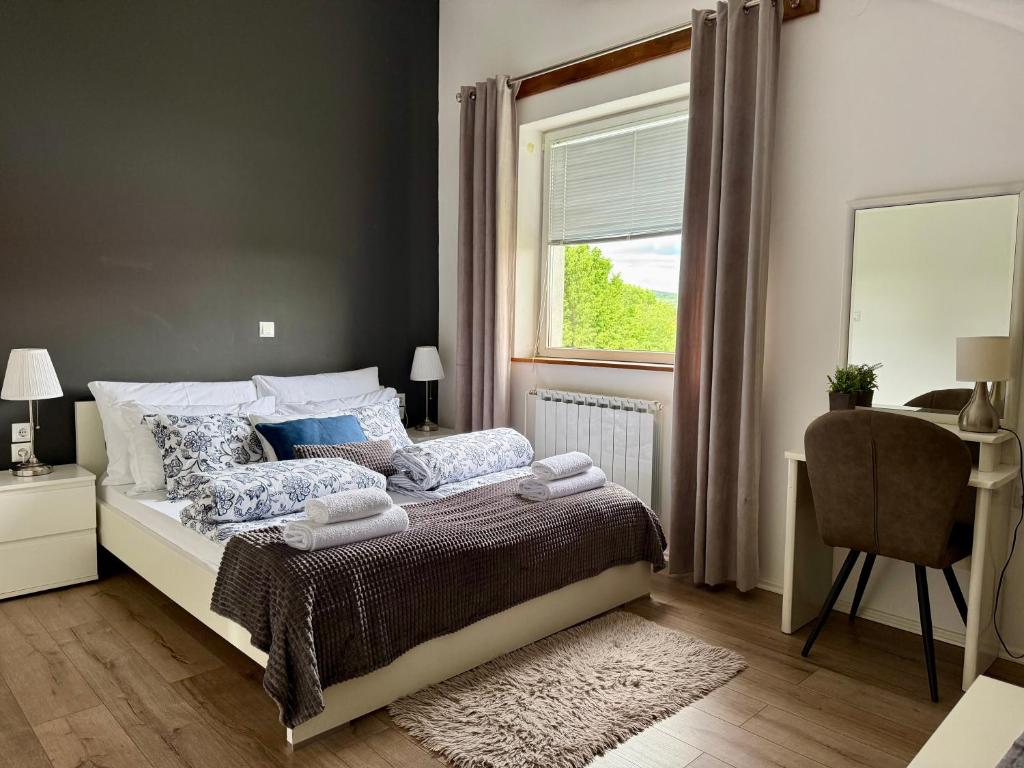 Posteľ alebo postele v izbe v ubytovaní Elysian Apartments
