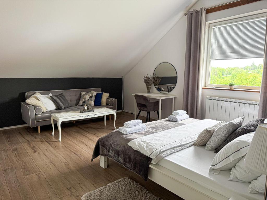 Posteľ alebo postele v izbe v ubytovaní Elysian Apartments