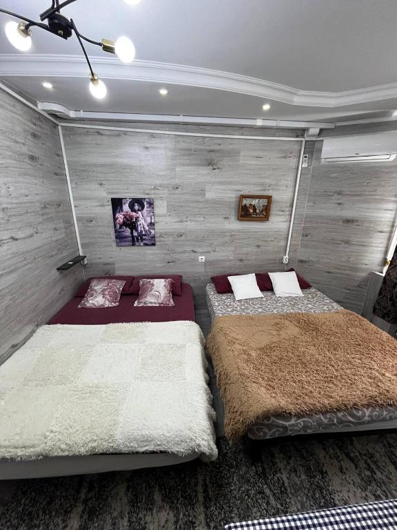 Una cama o camas en una habitación de OliverApartments