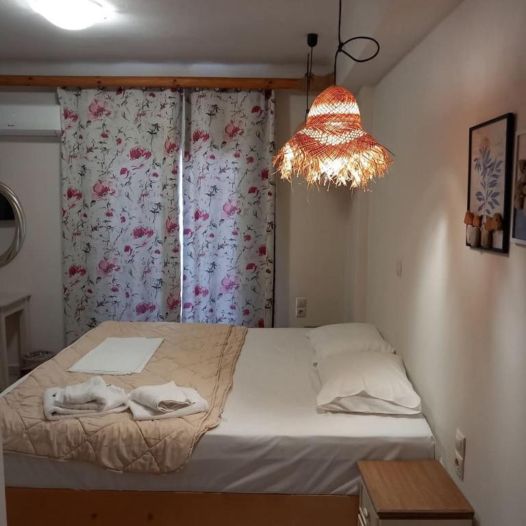 Postel nebo postele na pokoji v ubytování Hotel Assini Beach Tolo