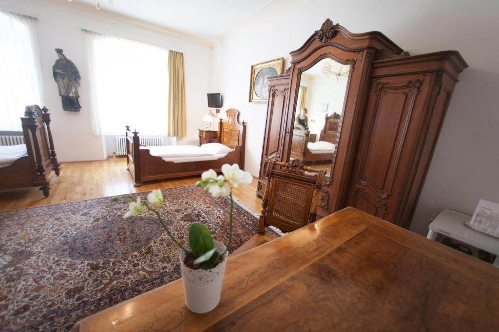 Postel nebo postele na pokoji v ubytování Hotel Wilder Mann