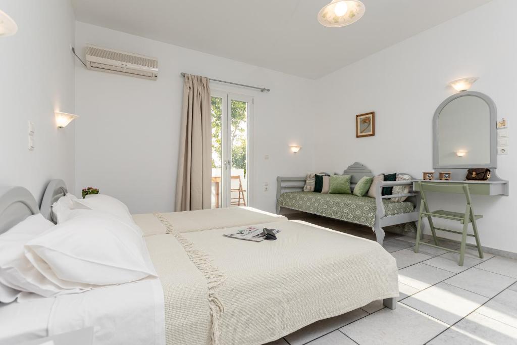 Posteľ alebo postele v izbe v ubytovaní Birbas Hotel
