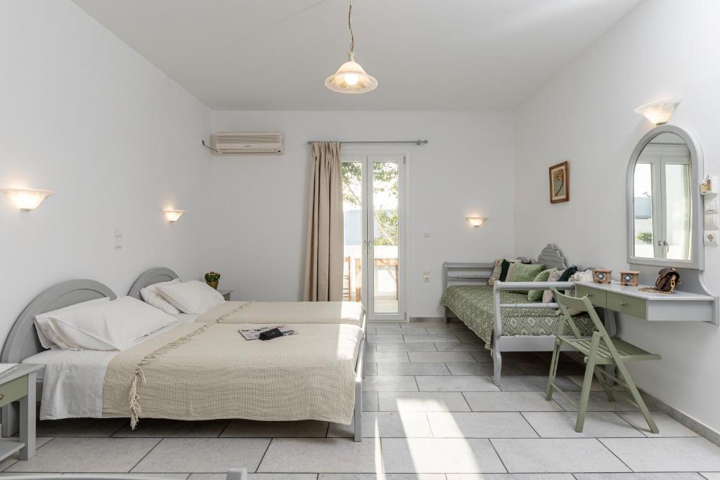 Posteľ alebo postele v izbe v ubytovaní Birbas Hotel