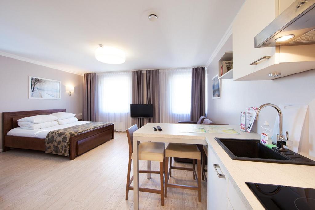 Postel nebo postele na pokoji v ubytování MyApartments