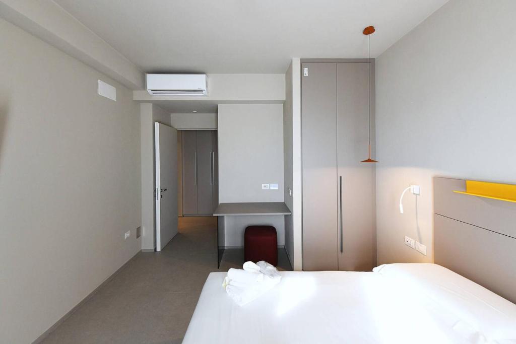Postel nebo postele na pokoji v ubytování Hotel Villa Cappugi