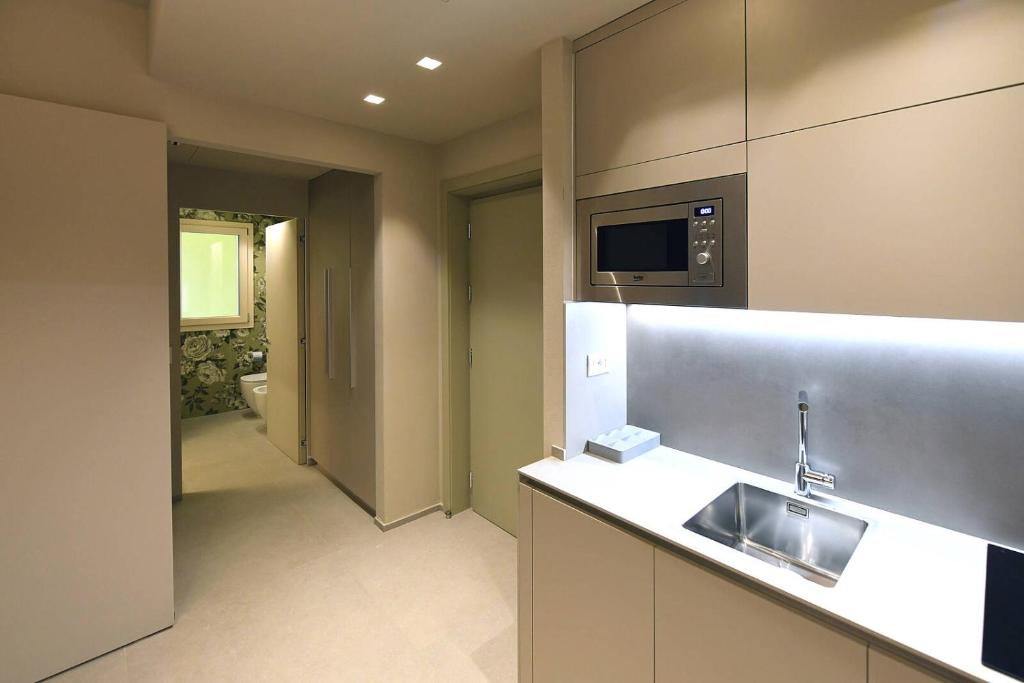 Kuchyň nebo kuchyňský kout v ubytování Hotel Villa Cappugi