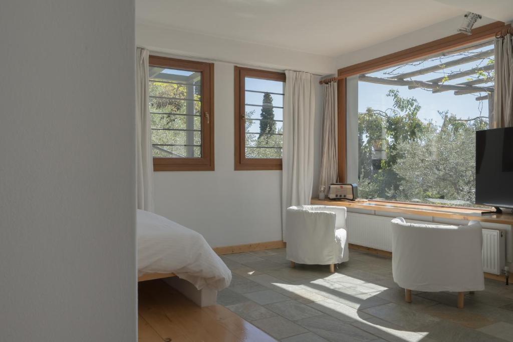Televízia a/alebo spoločenská miestnosť v ubytovaní Daria's Home
