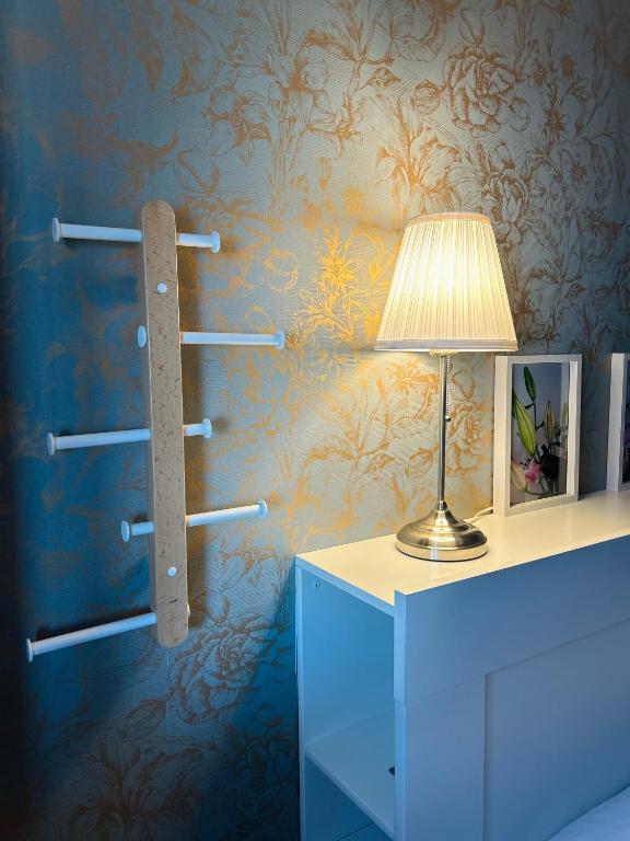 Postel nebo postele na pokoji v ubytování Hôtel Le Lys