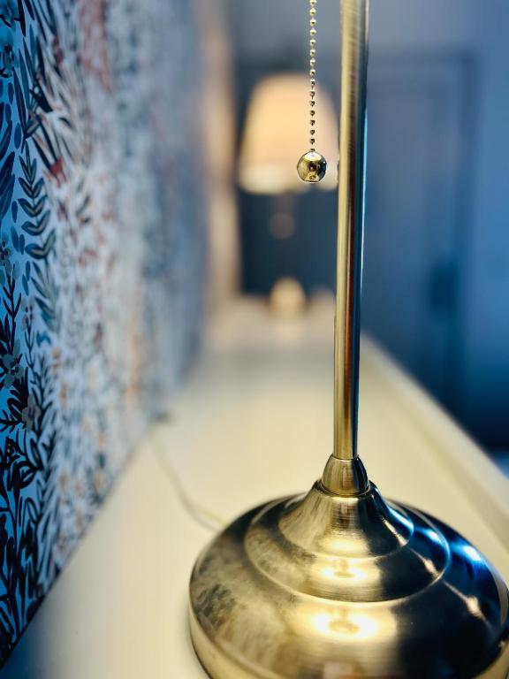 Postel nebo postele na pokoji v ubytování Hôtel Le Lys
