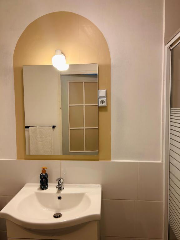 Koupelna v ubytování Hôtel Le Lys
