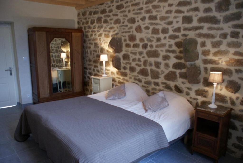 Postel nebo postele na pokoji v ubytování Le Clos des Capitaines, entre mer et campagne