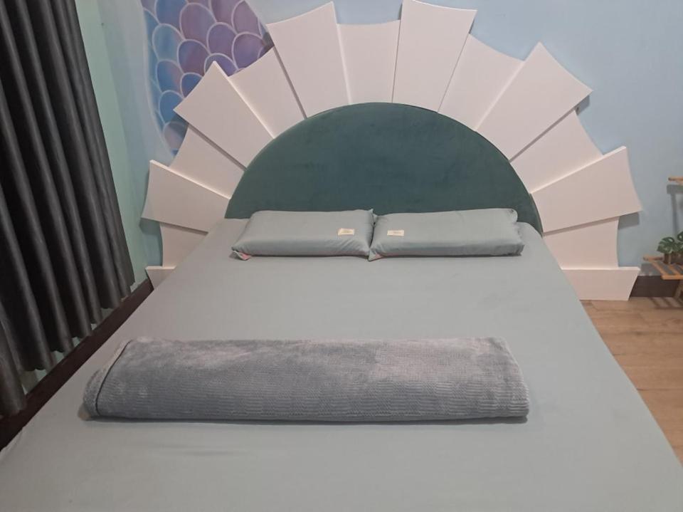 Postel nebo postele na pokoji v ubytování Homestay Casa 04