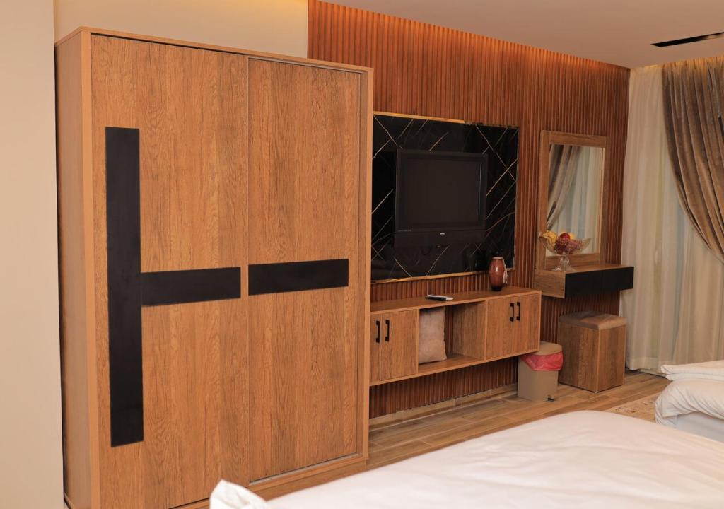 Postel nebo postele na pokoji v ubytování The Muse Luxury View Hotel