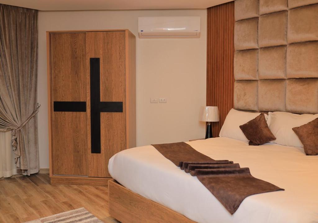 Postel nebo postele na pokoji v ubytování The Muse Luxury View Hotel