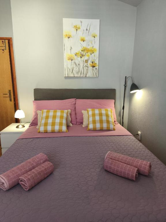 Posteľ alebo postele v izbe v ubytovaní Apartment LaMaro