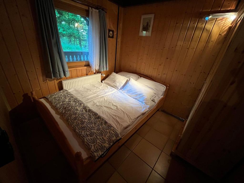 Postel nebo postele na pokoji v ubytování Jagdhütte