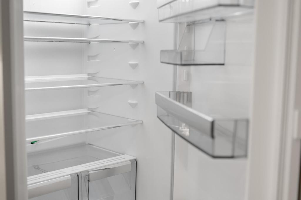 Kuchyň nebo kuchyňský kout v ubytování STAYY Rigi Suites - Self-check-in Premium Apartments - 20min to Lucern - 7min Walk to Lake - Public Transport - Washer Dryer
